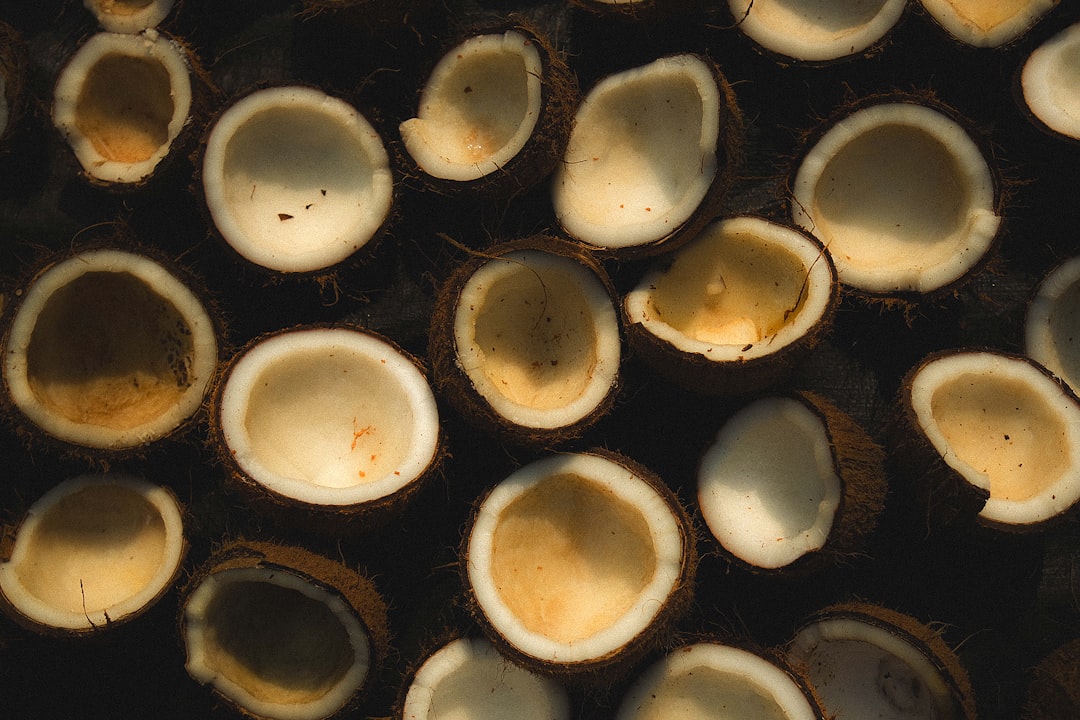 a bunch of coconuts that have been cut in half