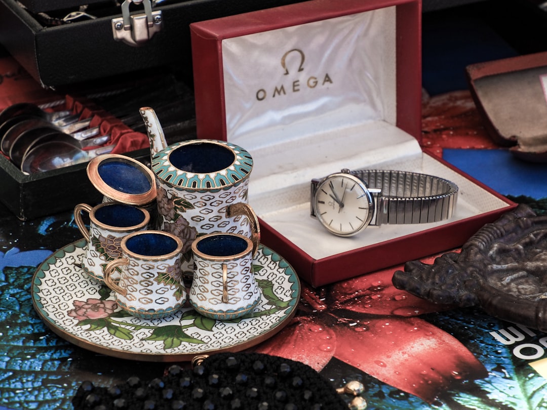 a table topped with lots of different types of cups and saucers